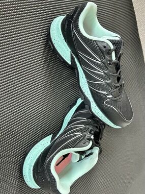 Fila Black woman’s Sneakers with Mint Interior and Sole Accents size 7